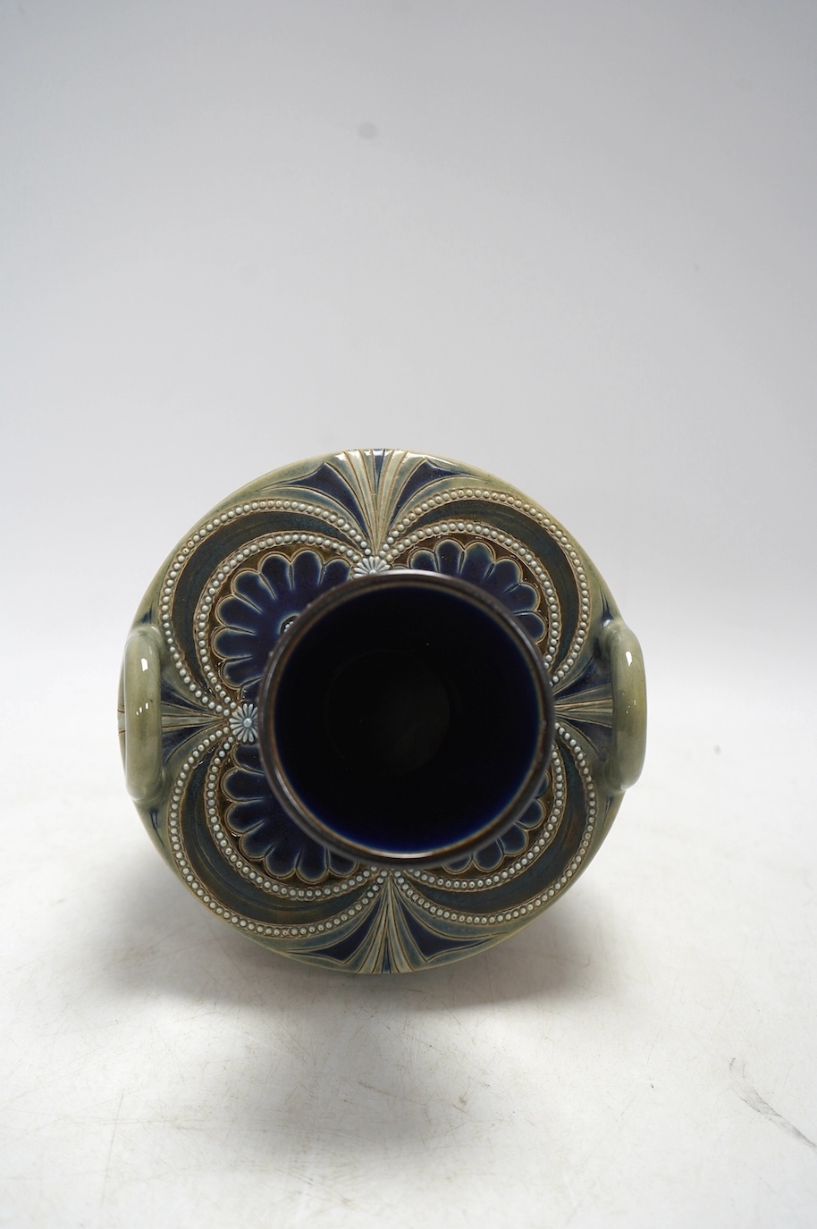 A Doulton Lambeth vase by Stormer, monogrammed and dated 1887, 20.5cm high. Condition - good